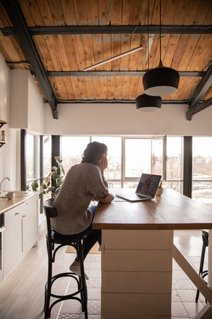 Woman on a video call in the kitchen